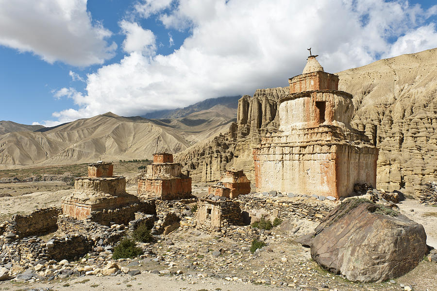 Tibetan Buddhism, weathered stupa in eroded landscape, Ghami, Upper Mustang, Nepal Photograph by Stefan Auth
