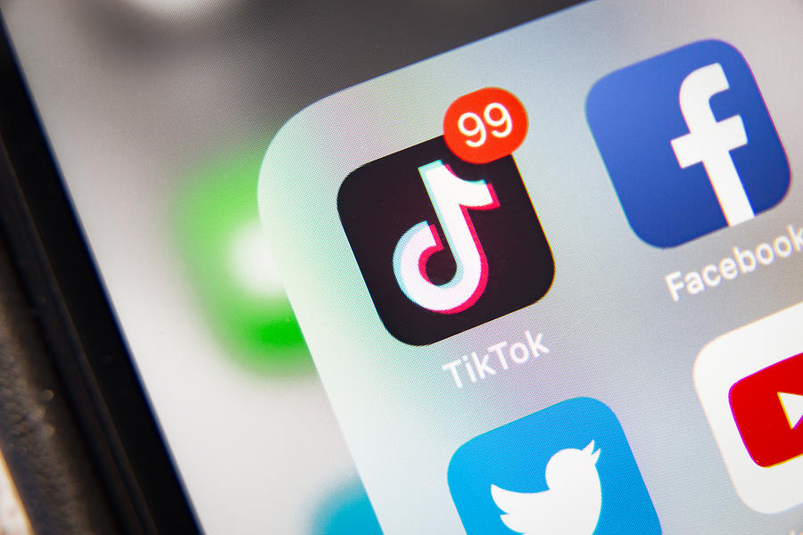 TikTok and Facebook application  on screen Apple iPhone XR Photograph by Anatoliy Sizov