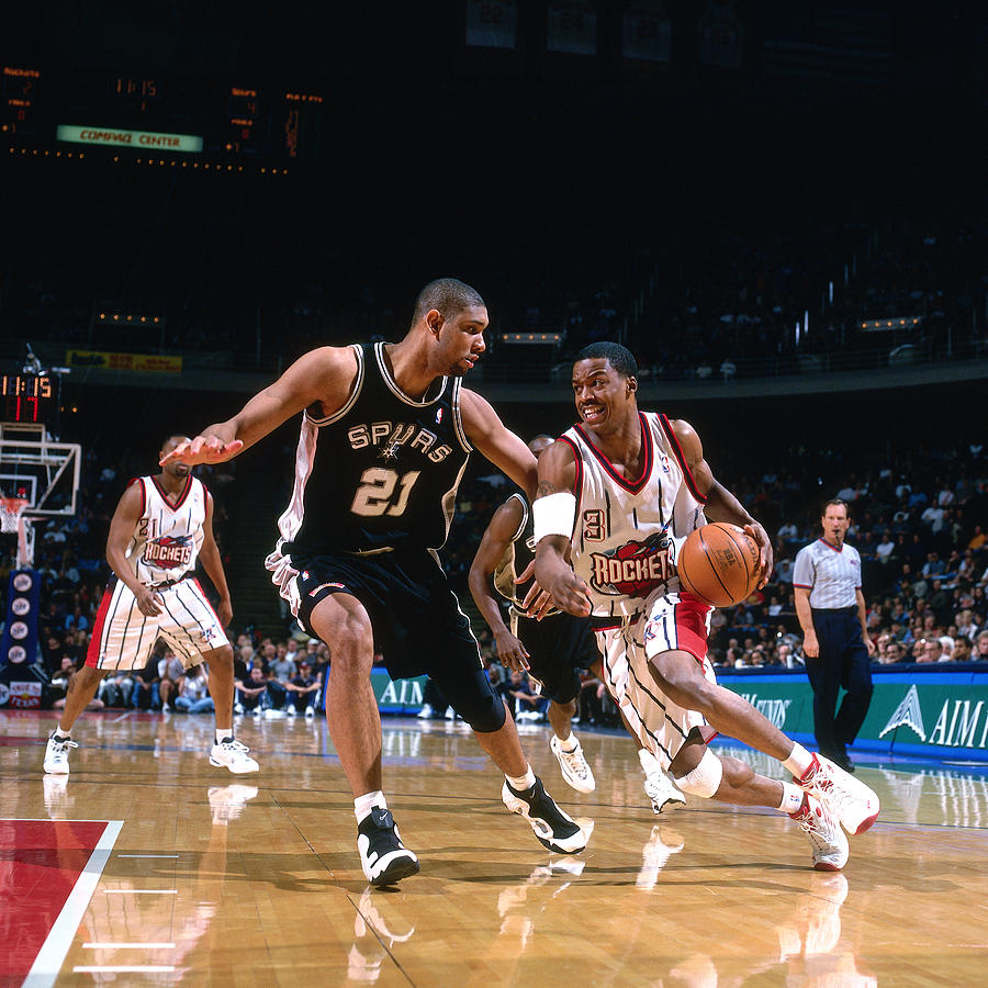 Tim Duncan and Steve Francis Photograph by Bill Baptist
