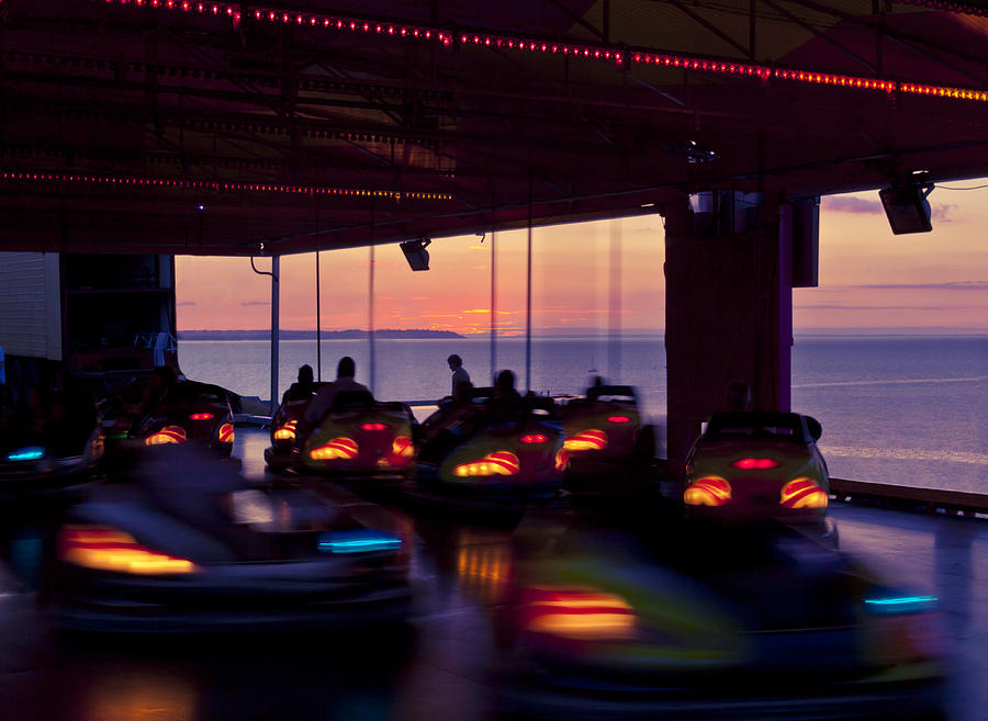 Time lapse view of bumper cars at sunset Photograph by David Oxberry