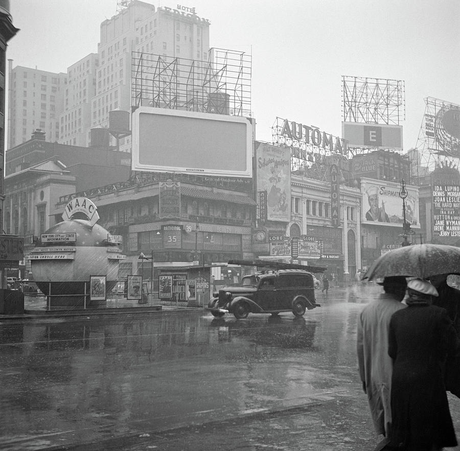 Times Square on a Rainy Day, New York City, 1943 Painting by John ...