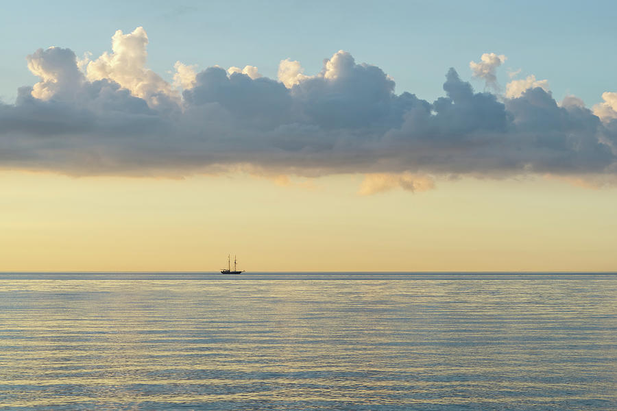 Tiny Tall Ship - Pale Gold and Blue Sailing Photograph by Georgia Mizuleva