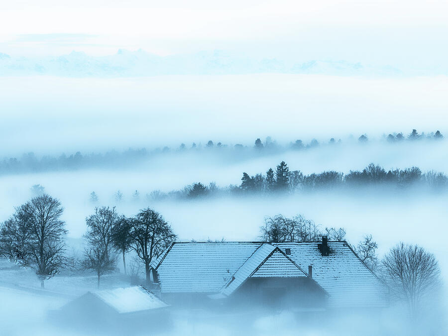 Winter Photograph - Tiny Village on a Hill with the Suisse Alps in the Background by Imi Koetz
