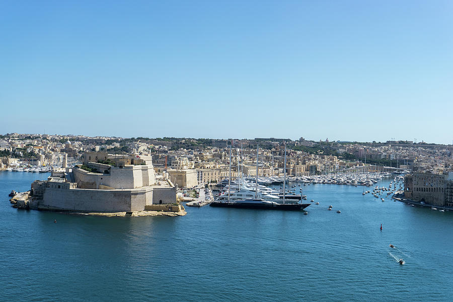 Tiny Water Taxies and Megayachts - Grand Harbour of Valletta Malta Photograph by Georgia Mizuleva