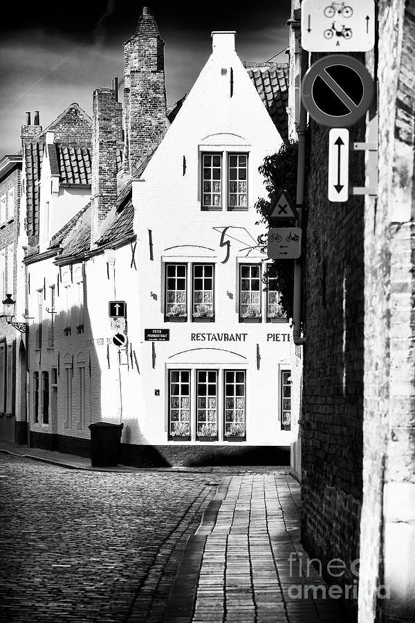 To the Restaurant in Bruges Photograph by John Rizzuto