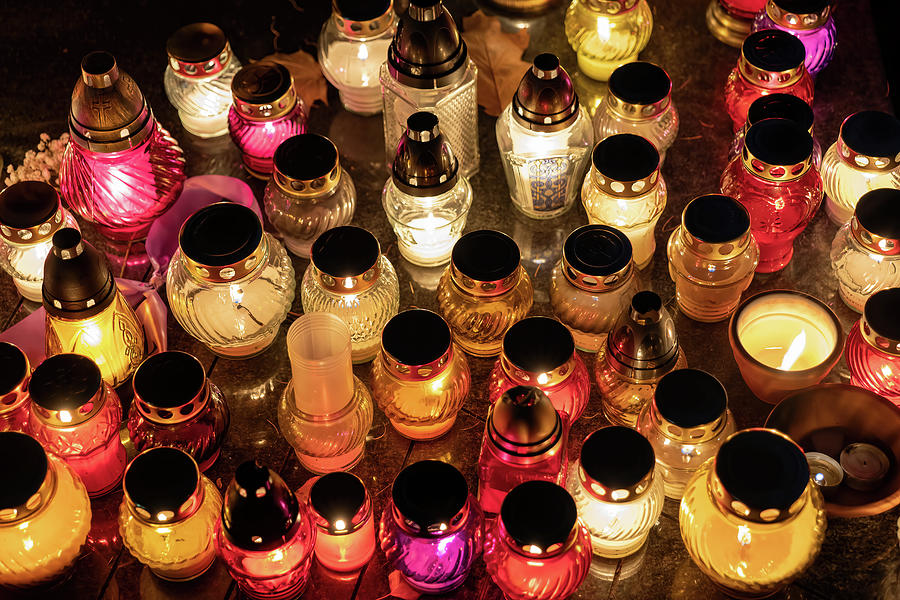 Tomb Candle Lights At Night Photograph by Artur Bogacki