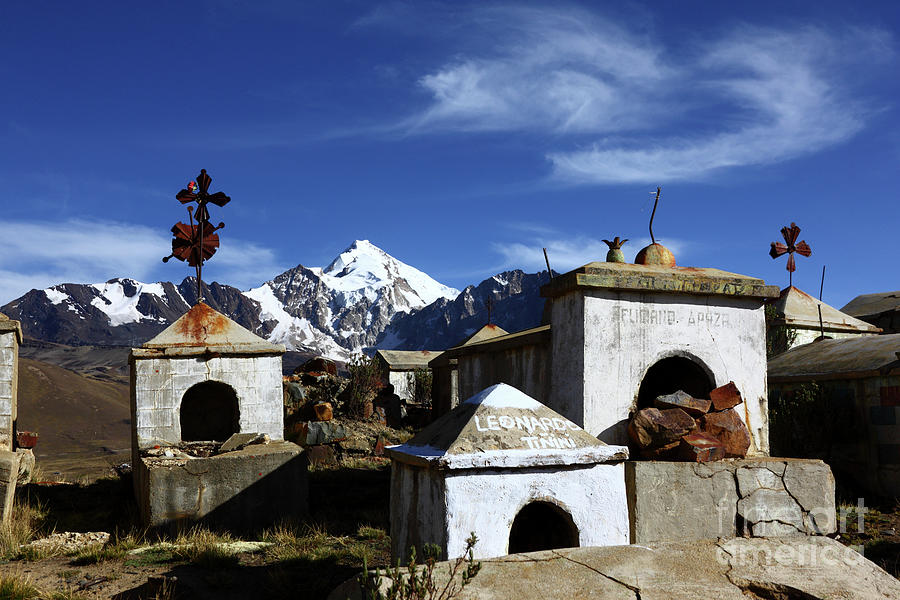 Tombs in Milluni cemetery and Mt Huayna Potosi Bolivia Photograph by James Brunker