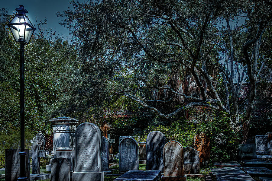 Tombstones and Lamp Post Under Spanish Moss Photograph by Darryl Brooks