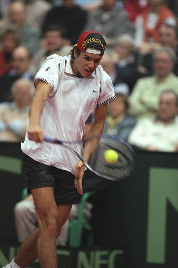 Tommy Haas of Germany plays a backhand drive Photograph by Phil Cole