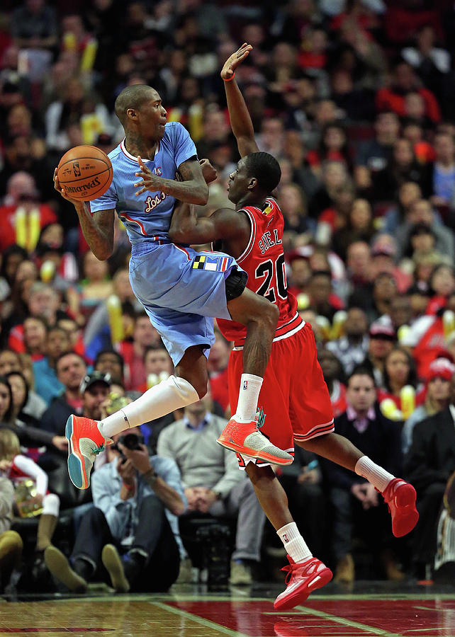Tony Snell and Jamal Crawford Photograph by Jonathan Daniel