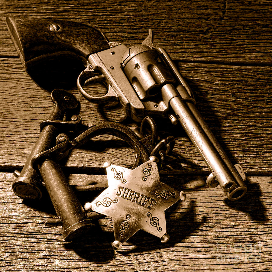 Tools of Western Justice - Sepia Photograph by Olivier Le Queinec