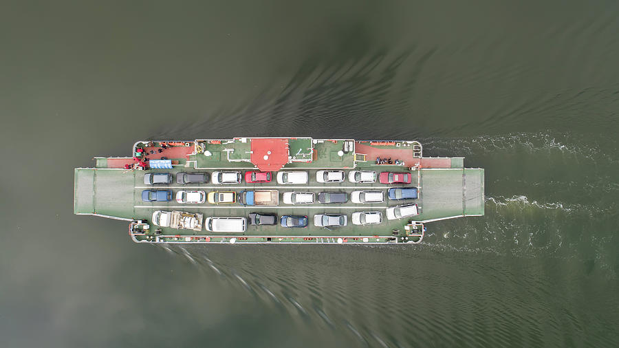 top down view of ferryboat sailing. Ferryboat transferring cars. Ferry transfers cars and passengers to the other side Photograph