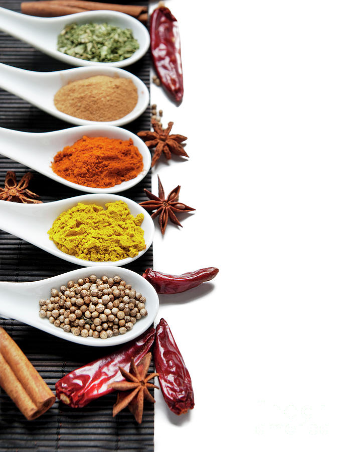 Top view on mixed dry colorful spices on white backgrou Photograph by Jelena Jovanovic