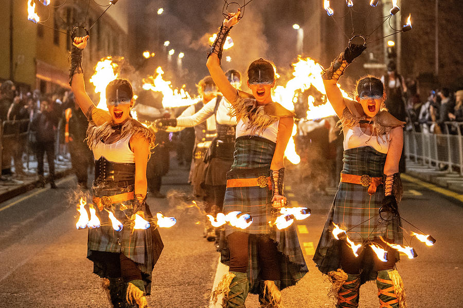 Torchlight procession on Royal Mile at Hogmanay in Edinburgh, Scotland