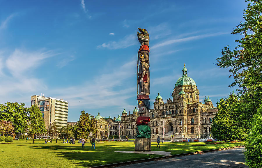 Totem Pole in Front of Victoria Parliament Photograph by Darryl Brooks