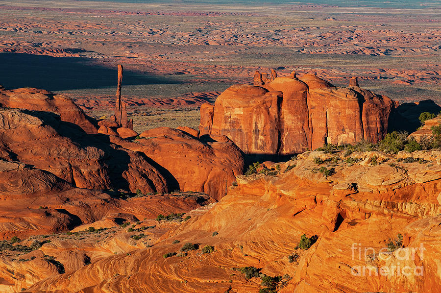 Totem Pole Spire and Red Rock Swirls Photograph by Bob Phillips