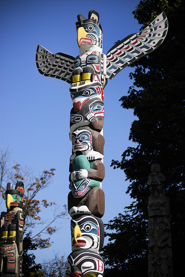 Totem Poles in Vancouver, BC, Canada Photograph by Kenneth-cheung