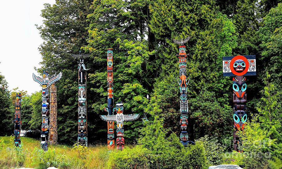 Totem Poles Photograph by Jon Burch Photography