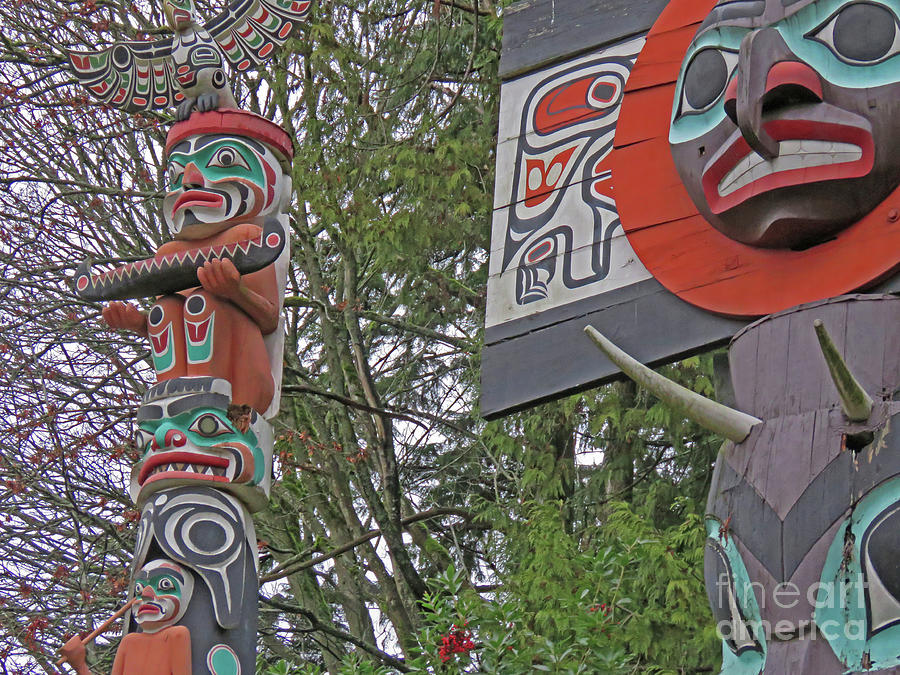 Totem Poles Photograph by Mary Mikawoz