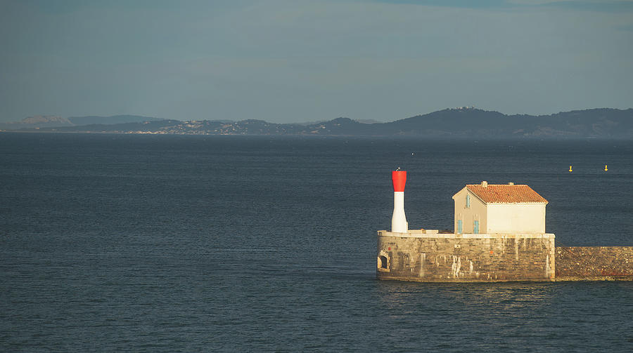 Toulon harbor lighthouse Photograph by Jean-Luc Farges