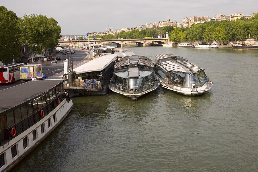Tourboats docked at a port, Seine River, Paris, France Photograph by Glowimages