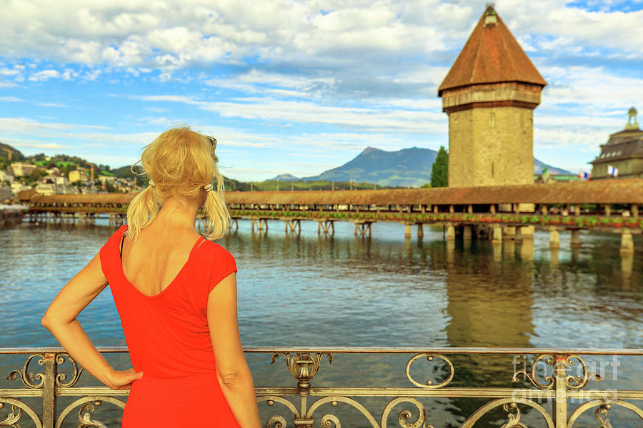 Tourist woman in Lucerne city Photograph by Benny Marty