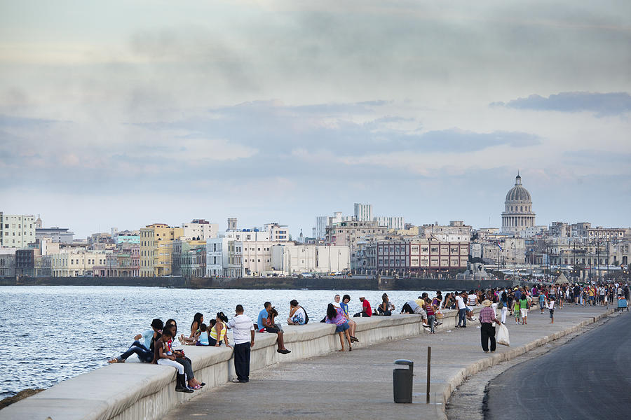 Tourists and Residents Enjoying the Malecón of Havana Cuba Photograph by YinYang
