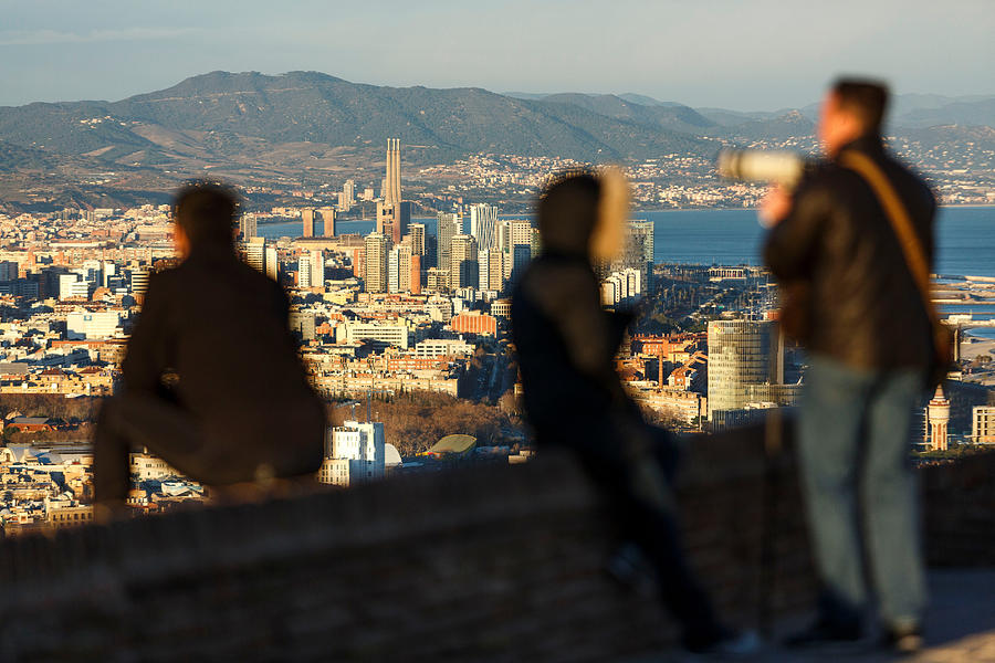 Tourists looking at view, Barcelona, Catalonia, Spain Photograph by Cultura Exclusive/Quim Roser