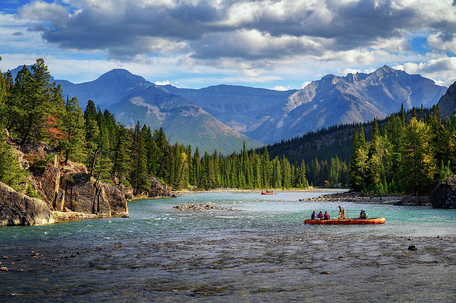 Tourists raft the Bow River in Banff National Park Photograph by ...