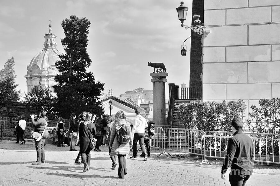 Tourists under she-wolf statue Photograph by Stefano Senise Tourists under she-wolf statue Photograph by Stefano Senise
