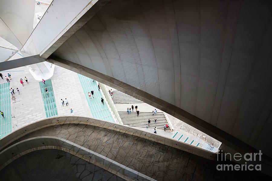  tourists walk the gardens around the Opera building, seen from inside. Photograph by Joaquin Corbalan