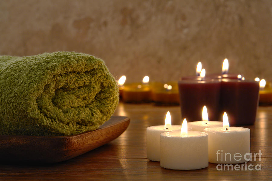 Towel and Aromatherapy Candles in a Dark Spa Photograph by Olivier Le Queinec