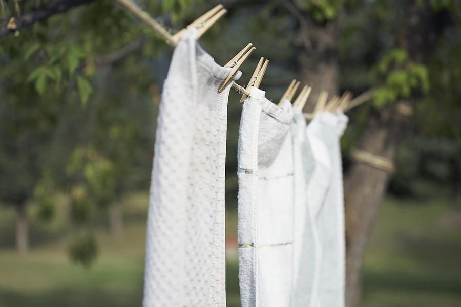 Towels drying on clothesline Photograph by Tammy Hanratty