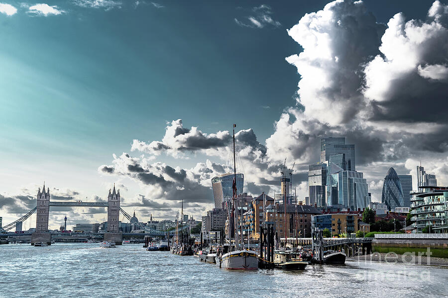 Tower Bridge And River Thames With Ships And Boats In Front Of Modern Office Buildings In The City O Photograph by Andreas Berthold