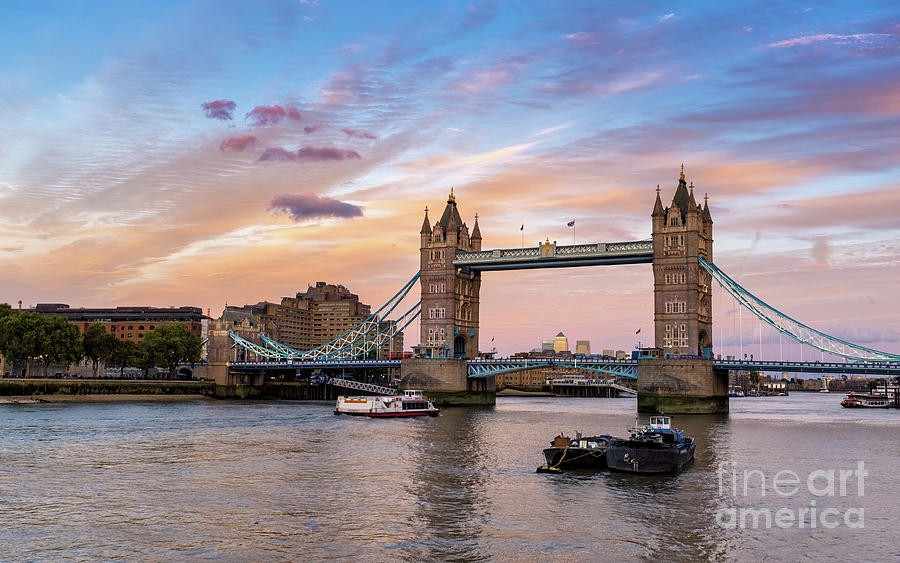 Tower Bridge, London at dusk. A pink glow lights the evening sky Photograph by Jane Rix