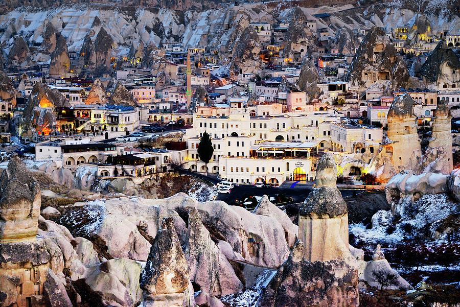 Town Of Goreme Sits Amid Eroded Hoodoo Fairy Chimneys. Cappadocia, Turkey Photograph