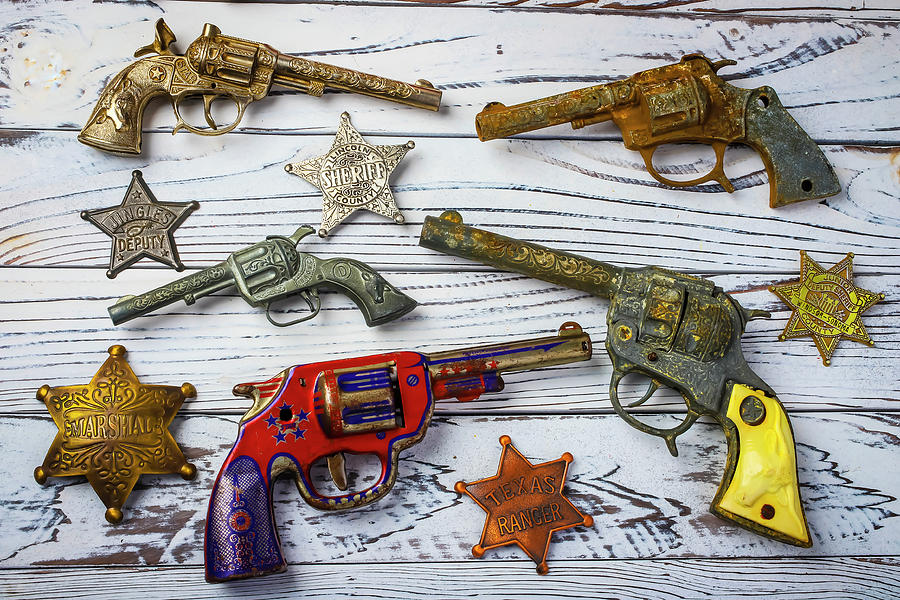 Toy Guns And Badges Photograph By Garry Gay