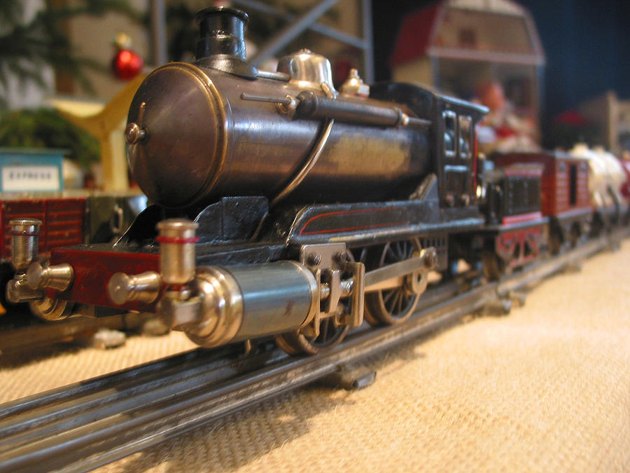 Toy locomotive Photograph by Clu