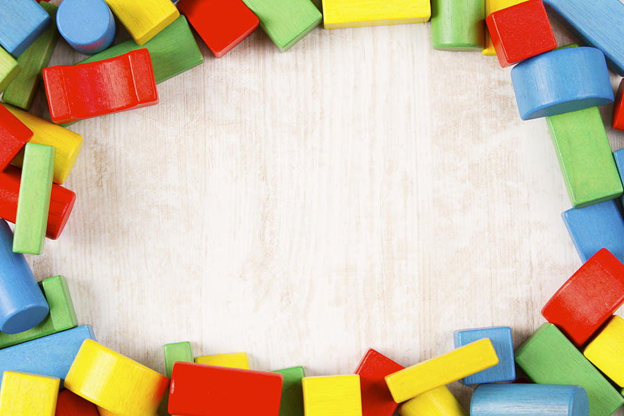 Toys blocks frame, multicolor wooden building bricks Photograph by Vladimirs