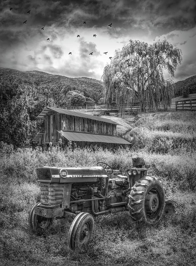 Tractor in the Farmers Field in Black and White Photograph by Debra and Dave Vanderlaan