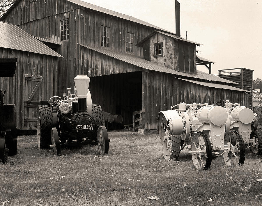 Tractors Outside Cotton Gin in Mississippi Photograph by James C Richardson