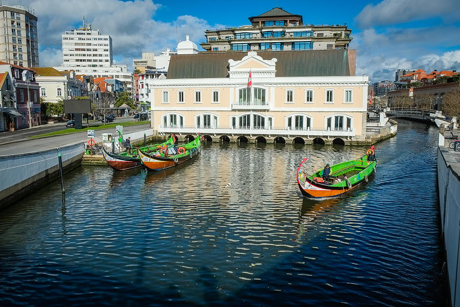 Traditional boats on the canal in Aveiro Photograph by Finn Bjurvoll Hansen