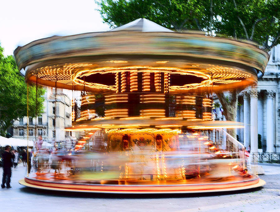 Traditional carousel with horses Photograph by Maxoidos