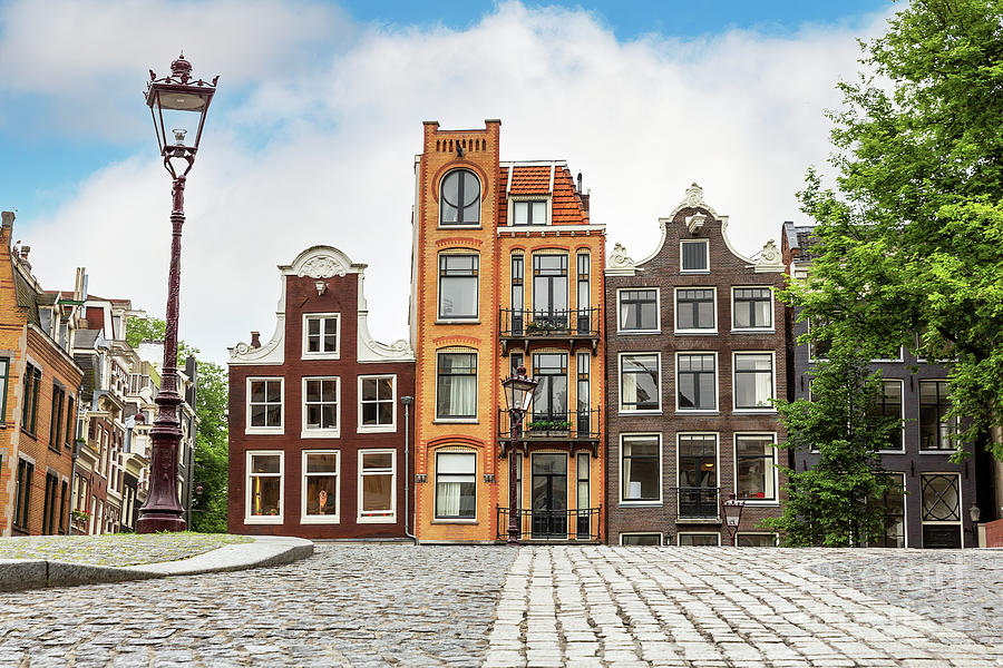 Traditional Dutch townhouses in Amsterdam Photograph by Jane Rix