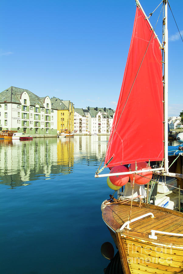 Red sail on a Traditional fishing boat, Alesund, Norway Photograph by Neale And Judith Clark