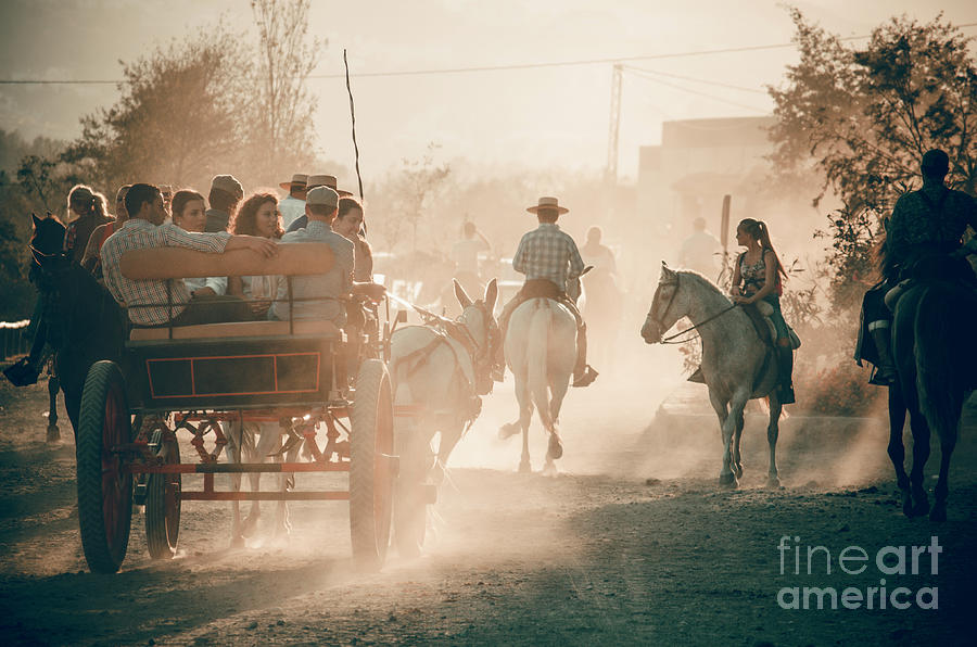 Traditional horse riders and carriages at Spanish Romeria Photograph by Perry Van Munster