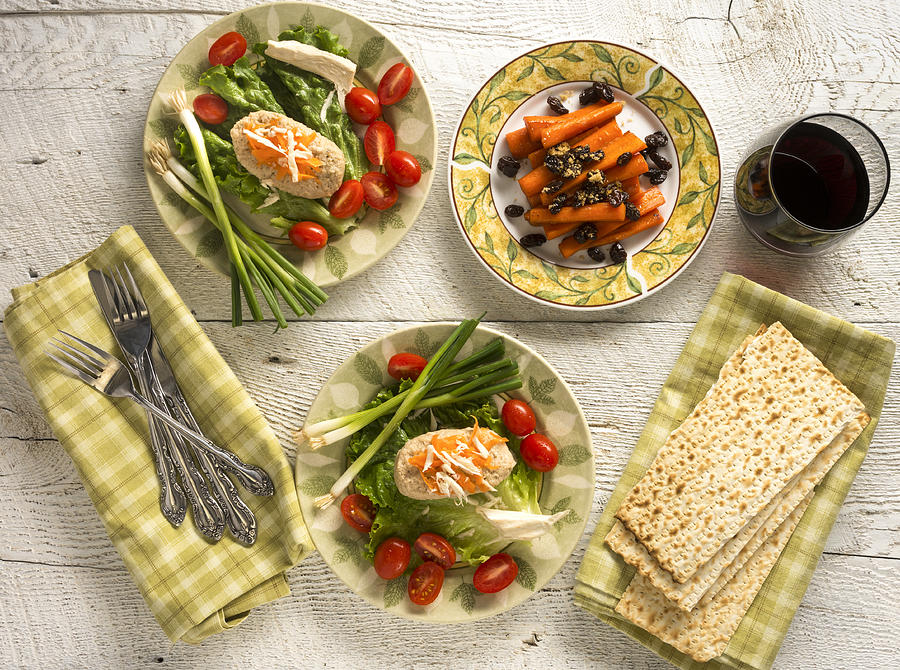Traditional Jewish Passover dishes of Gefilte Fish and Tsimmes Photograph by Jrwasserman