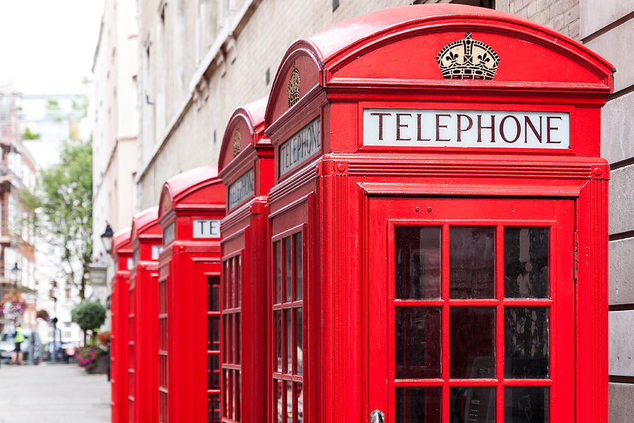 Traditional red telephone booths in London Photograph by Bukki88