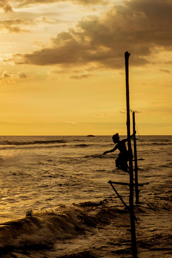 Traditional Stilt Fishing Photograph by Arj Munoz