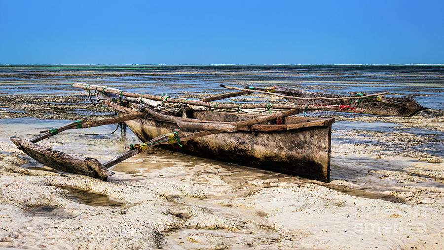 Traditional Tanzanian boat Photograph by Lyl Dil Creations